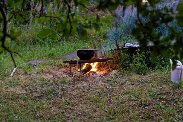 Cooking on a fire in cast iron, russia
