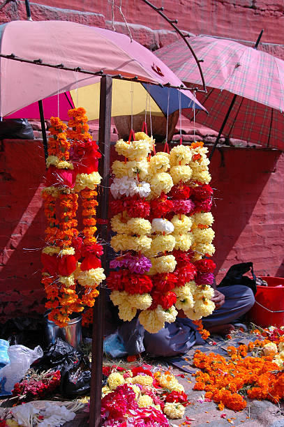 Kathmandu market with orange flowers for the rituals of its culture