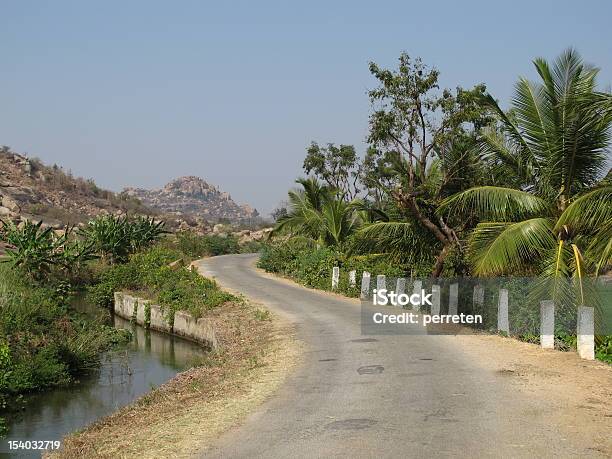 Road And Coconut Trees Stock Photo - Download Image Now - Agriculture, Asia, Banana Tree