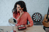 Woman doing her make-up