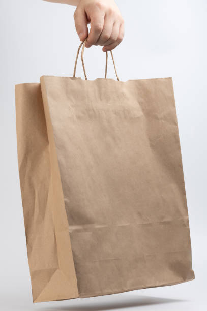 istock Hand carry recycled paper bag 1540330795