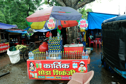 Haridwar, Uttarakhand, India –  May 02, 2023: Mineral water, Cold drink or soda stall near roadside