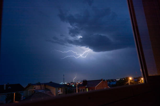 istock Powerful lightning during thunderstorm, bright lightning in the sky during a thunderstorm 1540341426