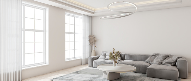 Living room interior is modern style, minimal, peaceful relaxation, wooden floor, creamy white wall, comfortable sofa, carpet, pillow, coffee table, vase, lamp. Natural light from window. 3D render.