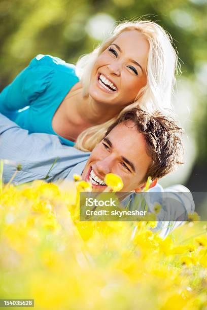 Cheerful Couple Enjoying In The Nature Stock Photo - Download Image Now - Adult, Adults Only, Agricultural Field