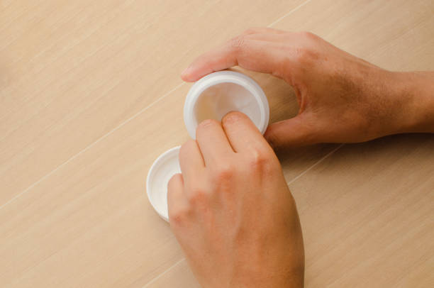 istock Touching softness: close-up on hands massaging a skin cream in a circular motion. 1540367164