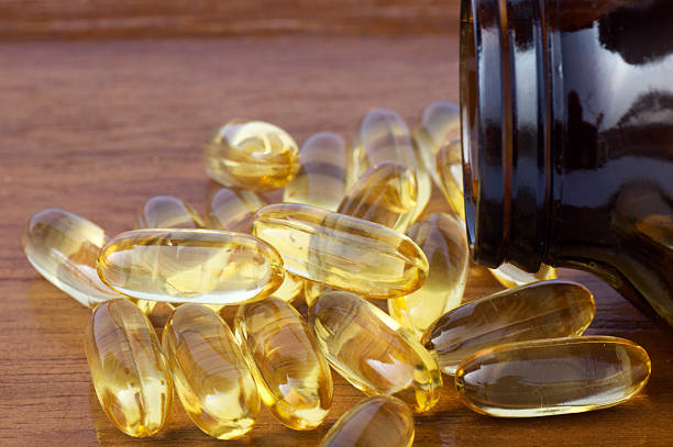 lachs-öl und nachtkerze softgel kapsel - fish oil cooking oil capsule herbal medicine stock-fotos und bilder