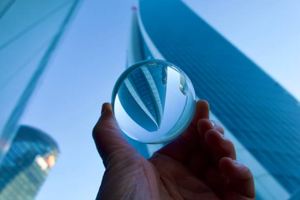 istock Crystal ball against modern buildings 1540378657