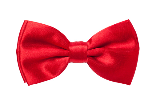 A red bow tie isolated on a white background