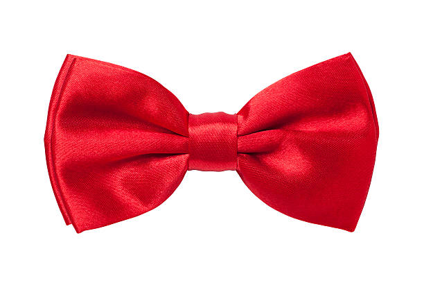 Red bow tie on white background A red bow tie isolated on a white background bow tie photos stock pictures, royalty-free photos & images