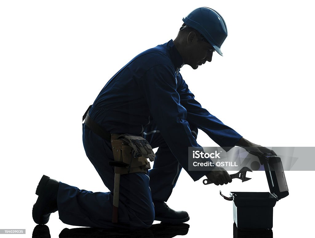 repair man worker silhouette one caucasian repairman worker silhouette in studio on white background In Silhouette Stock Photo