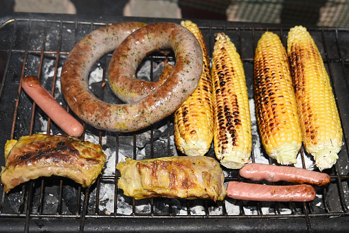 barbecue with sweet corn meat and sausages