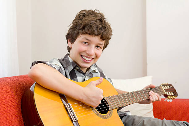 istock Thumbs up and smile for Loving Guitar 154041241