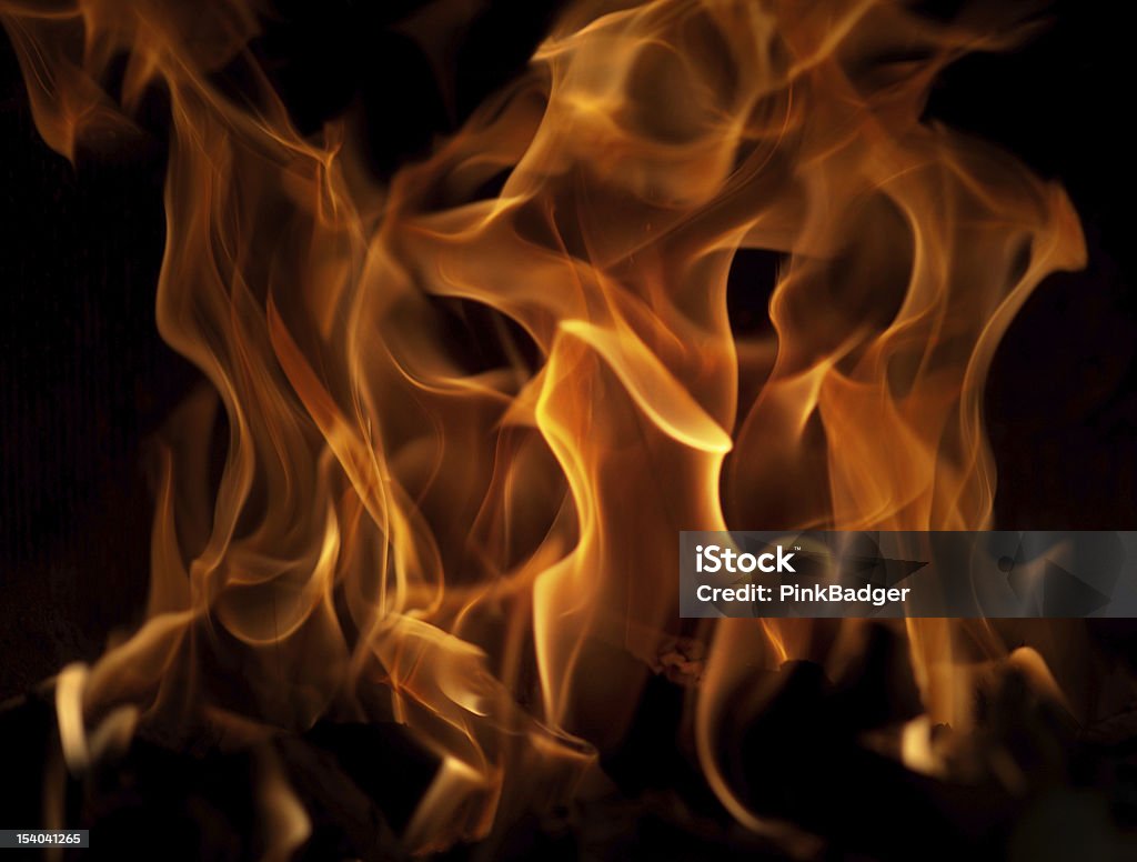 Flames Close-up of fire and flames on black background Backgrounds Stock Photo