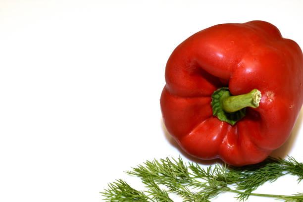 Two sweet red pepper on white background
