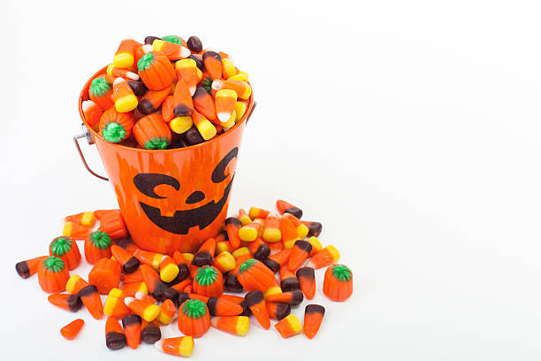 istock Bucket of Halloween Candy on White, Copy Space 154043804