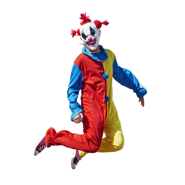 Portrait of a smiling clown with balloons isolated on white
