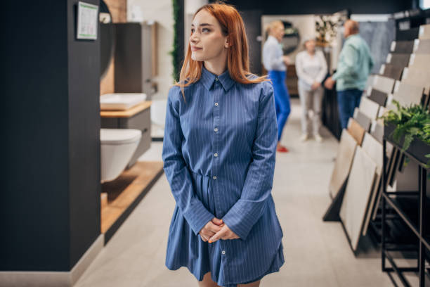 istock Woman shopping for bathroom equipment 1540454328