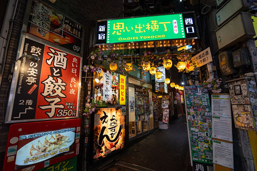Tokyo, Japan - June 30, 2023 : Omoide Yokocho in Shinjuku, Tokyo, Japan. Omoide yokocho is a narrow street packed with many Japanese restaurants and bars.
