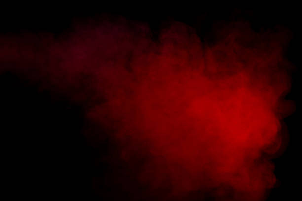 istock Orange and red steam on a black background. 1540459870