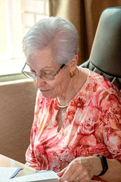 istock Senior woman working/studying at home 1540479219