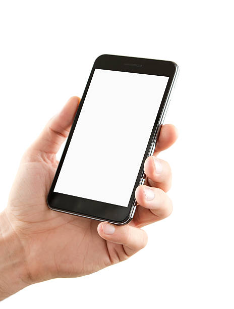 Blank smart phone in hand with clipping path Male hand holding blank smart phone isolated on white background with clipping path for the screen man looking at phone over shoulder stock pictures, royalty-free photos & images