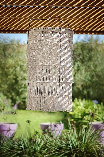 Loom-woven lamp in outdoor patio - Buenos Aires - Argentina