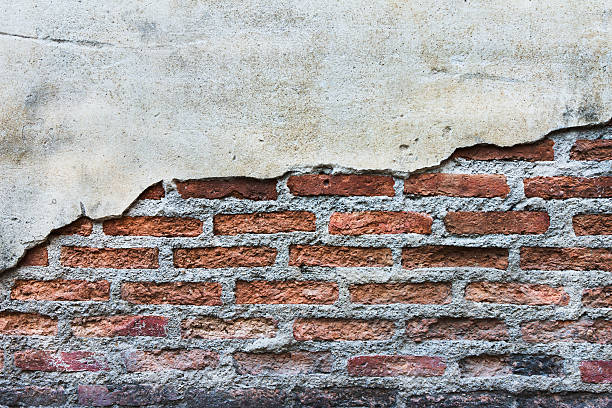 istock grunge crack cement wall for background 154050896