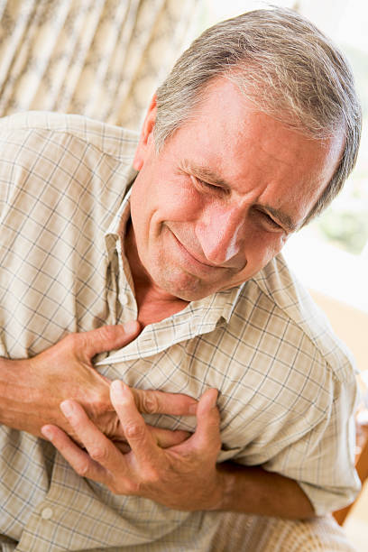 istock Man Clutching His Heart 154057194