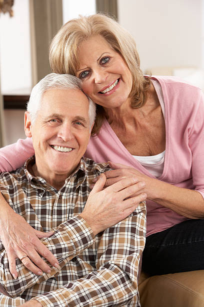 istock Happy Senior Couple Relaxing At Home 154057434