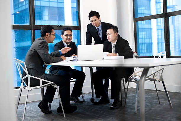 istock An Asian business team having a meeting 154059428