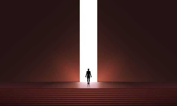 istock Man silhouette in front of glowing portal, futuristic vector background, Abstract cyberpunk architecture with gradient lighting. New Possibilities, Hope - Business Finding Solution Vector Concept - Businessman Standing in Dark, Symbol of Light at the End 1540606820