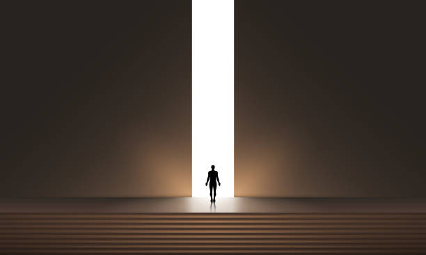 istock Man silhouette in front of glowing portal, futuristic vector background, Abstract cyberpunk architecture with gradient lighting. New Possibilities, Hope - Business Finding Solution Vector Concept - Businessman Standing in Dark, Symbol of Light at the End 1540606824
