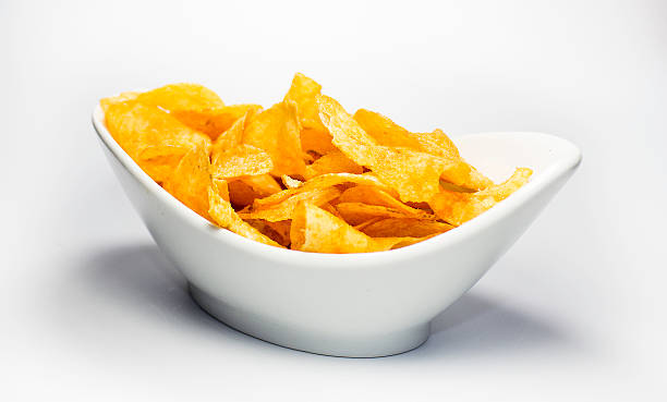 crisps in a bowl stock photo
