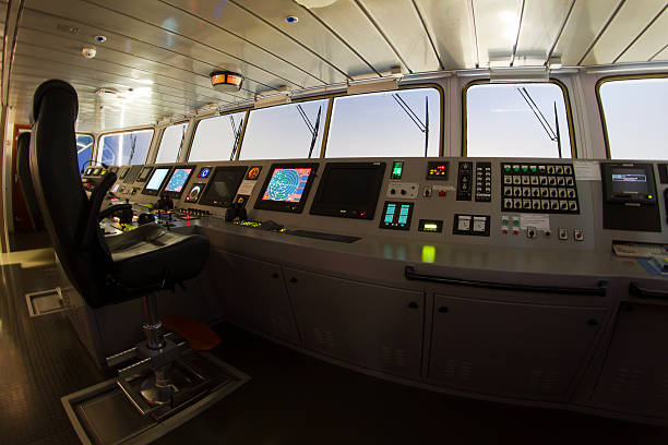 istock Fisheye shot of a modern cargo ship’s navigational bridge 154063410