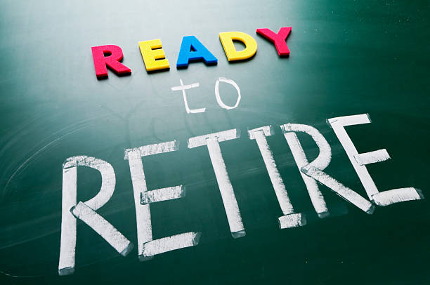 istock Ready to retire written on a blackboard in chalk and magnets 154064356