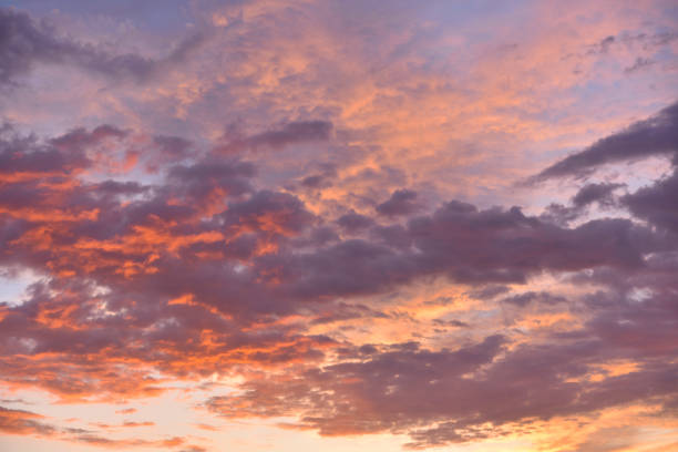 istock Stormy sunset. Bright red and blue clouds and the setting sun. 1540645560