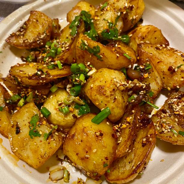 istock Roasted potatoes with spice and sesame 1540651131