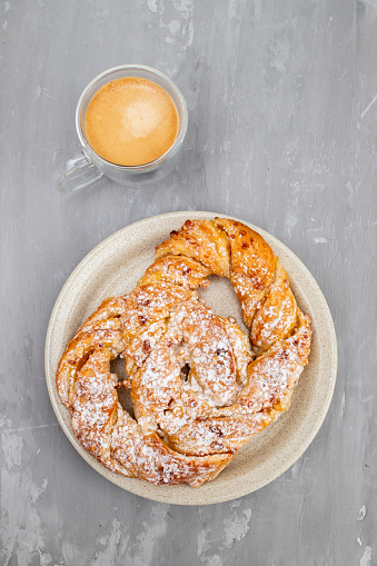 Handcrafted Sweet Brezel on plate. Pastry for a Delicious Snack