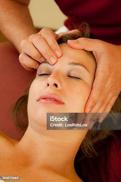 Closeup Of Woman Receiving Pressure Point Massage Stock Photo - Download Image Now - 20-29 Years, Adult, Alternative Medicine