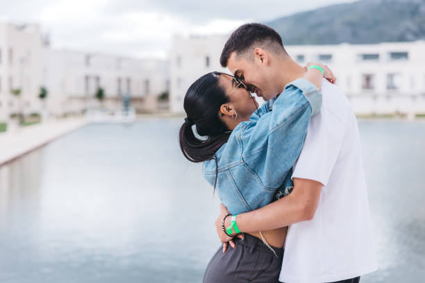 istock Beautiful young happy couple hugging 1540762824