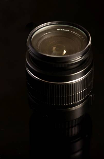 istock vertical photo lens on black background with selective focus 1540767500
