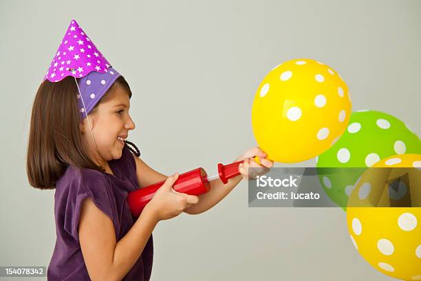 Inflating Balloons Stock Photo - Download Image Now - Adolescence, Adult, Air Pump