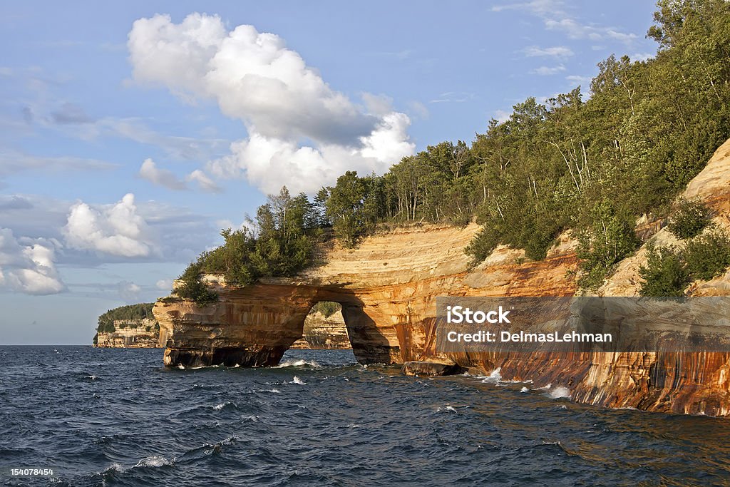 Pictured Rocks National Lakeshore Pictured Rocks National Lakeshore in evening sunlight.These colorful formations are on the Lake Superior shoreline on Michigan's Upper Peninsula. Lake Stock Photo