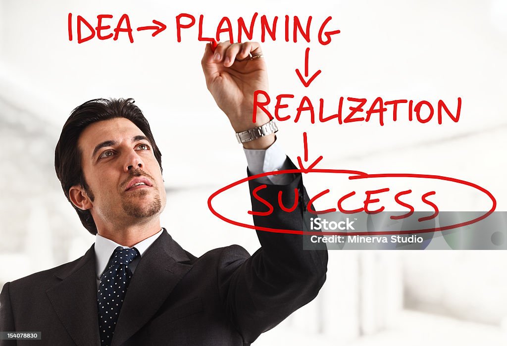 Way to success Businessman showing the way to success Adult Stock Photo