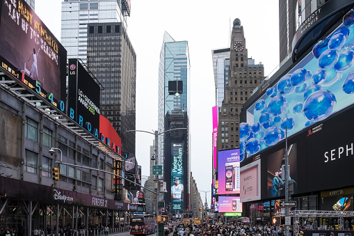 New York – May, 2023 – This photograph showcases the striking architectural detail of Times Square, an iconic commercial intersection, bustling tourist destination, vibrant entertainment hub, and dynamic neighborhood located in Midtown Manhattan, New York City. The image captures the essence of Times Square, with its dazzling billboards, vibrant neon lights, and towering skyscrapers that define the iconic cityscape. As a global symbol of excitement and energy, Times Square draws millions of visitors each year, who come to experience its unique blend of culture, entertainment, and vibrant atmosphere. This photograph invites viewers to immerse themselves in the architectural marvels of Times Square and witness the pulsating heartbeat of New York City.