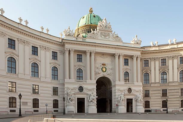 Michaelerplatz Vienna Michaelerplatz Vienna, landmark and historic building of Hofburg the hofburg complex stock pictures, royalty-free photos & images
