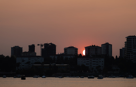 Sunset over by the buildings. \nLocation : Istanbul - Turkey.