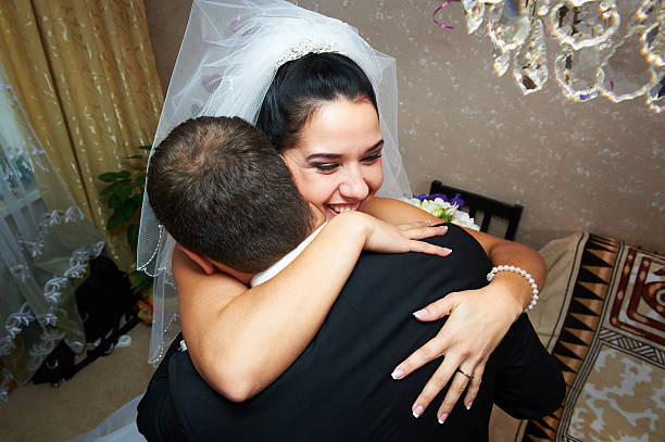 istock Happy embrace bride and groom 154084817