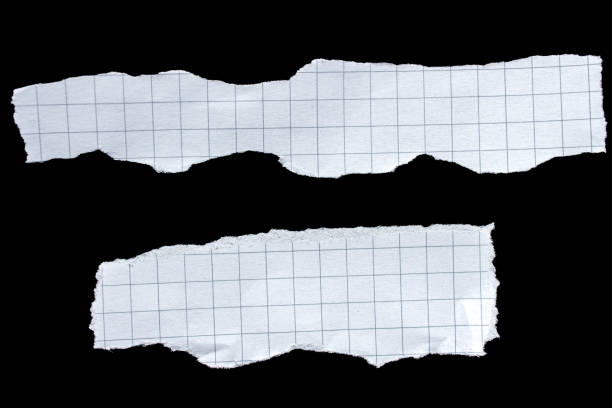 istock Rip paper piece isolated on a black background 1540851740